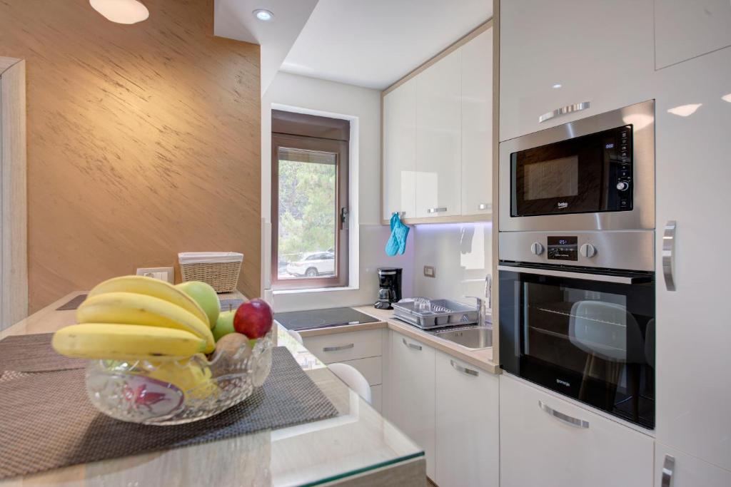 Kuchyň nebo kuchyňský kout v ubytování Apartment Medusa