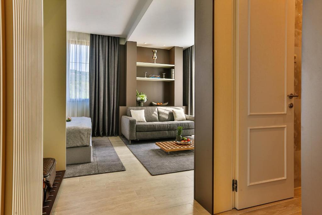 Posteľ alebo postele v izbe v ubytovaní Avanti Hotel & Spa