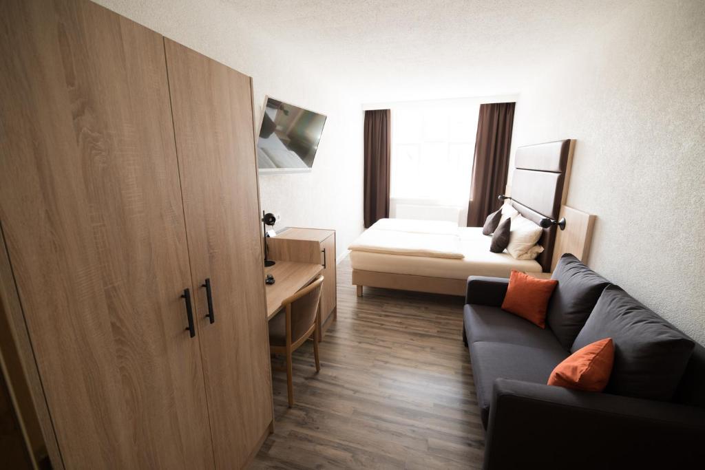 Postel nebo postele na pokoji v ubytování Hotel PIAZZA