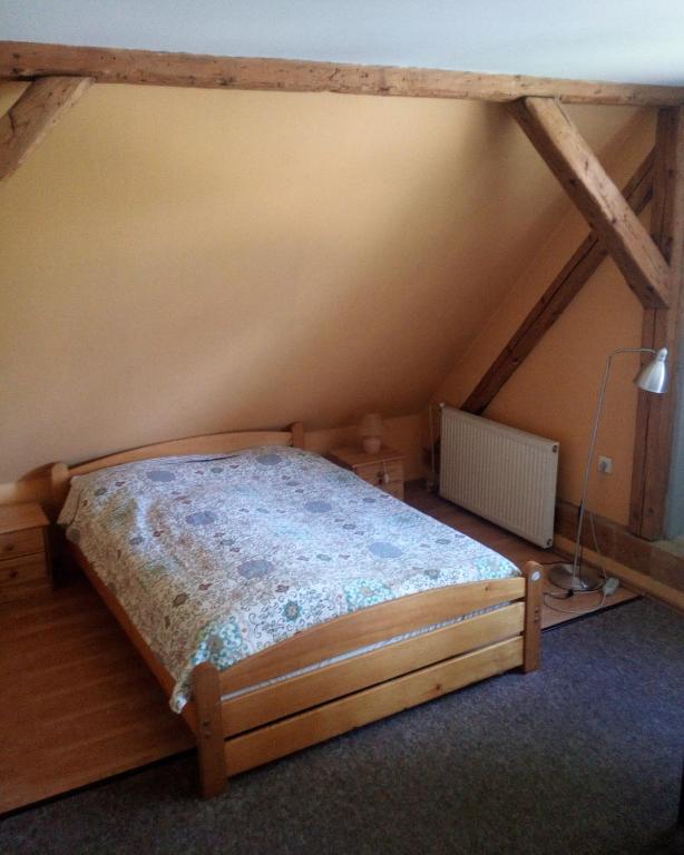 Postel nebo postele na pokoji v ubytování Pod Kasztanem
