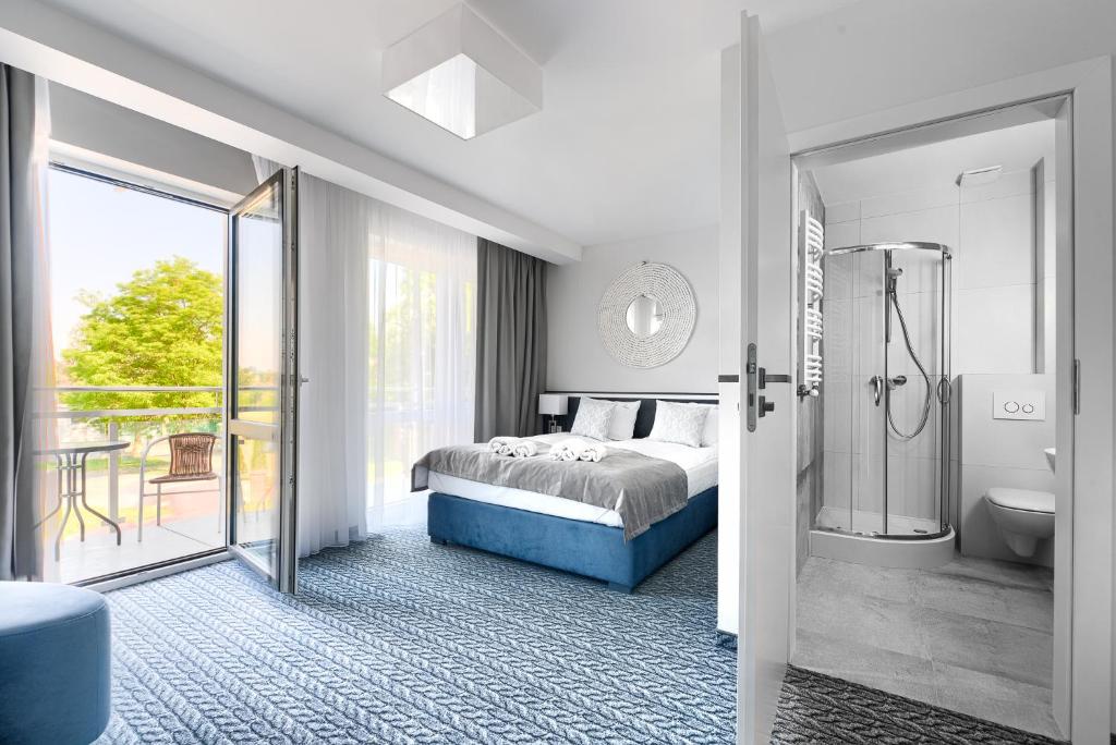 Postel nebo postele na pokoji v ubytování Szymański Holiday Rooms