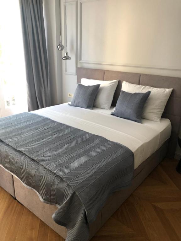 Łóżko lub łóżka w pokoju w obiekcie Muse luxury rooms