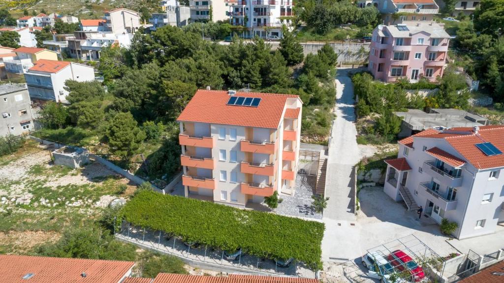 an aerial view of a building with an orange roof at Apartmani "Grgic" in Omiš