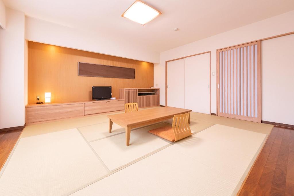 TV a/nebo společenská místnost v ubytování Yuzawa Toei Hotel