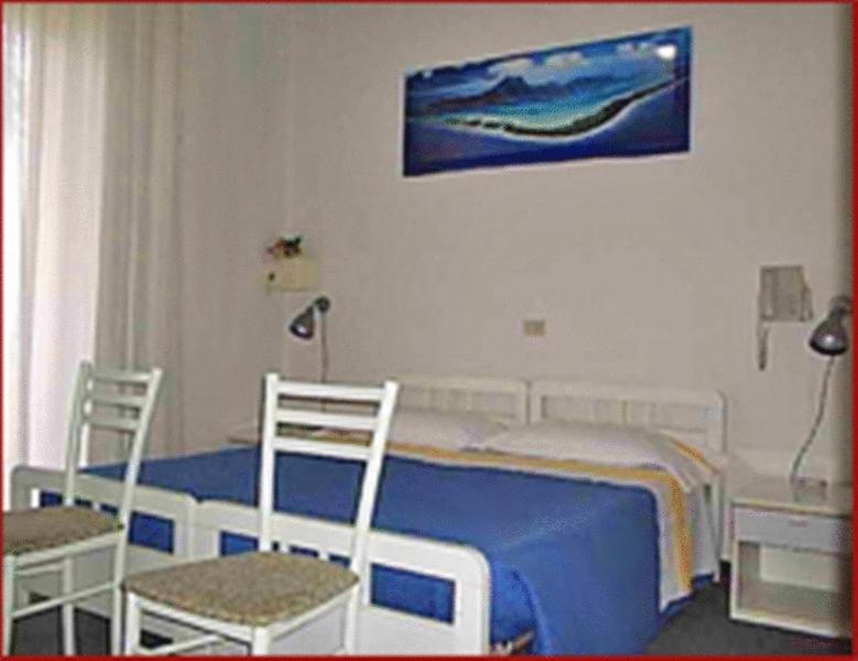 Postel nebo postele na pokoji v ubytování Hotel Tuscolano