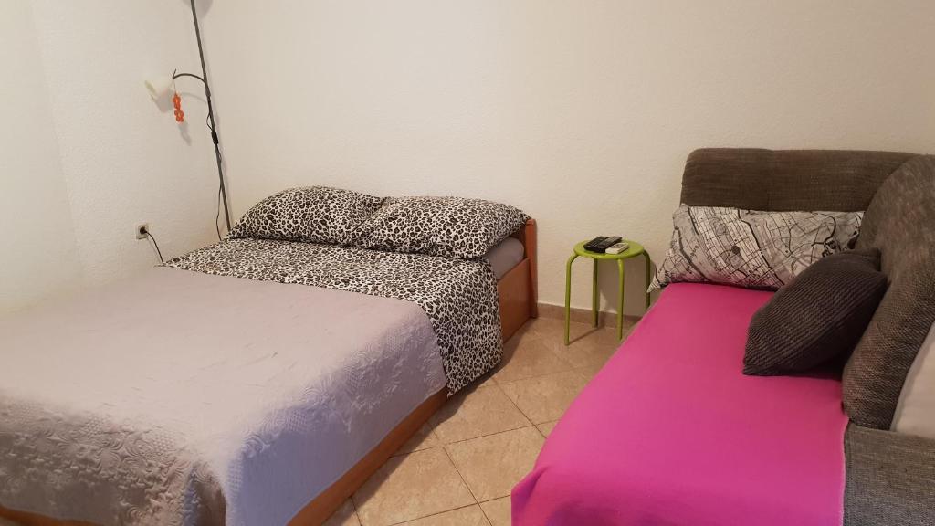 Postel nebo postele na pokoji v ubytování Apartment Gobov