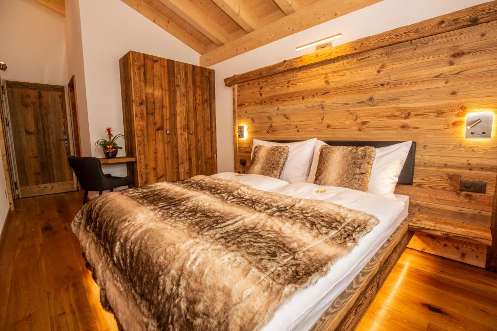 Postel nebo postele na pokoji v ubytování Palace Luxury Wellness Apartment and Boutique Hotel Ski-in-out