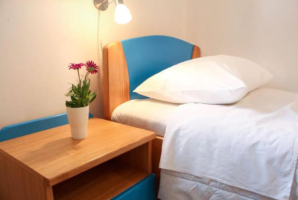 Postel nebo postele na pokoji v ubytování Casa Nara