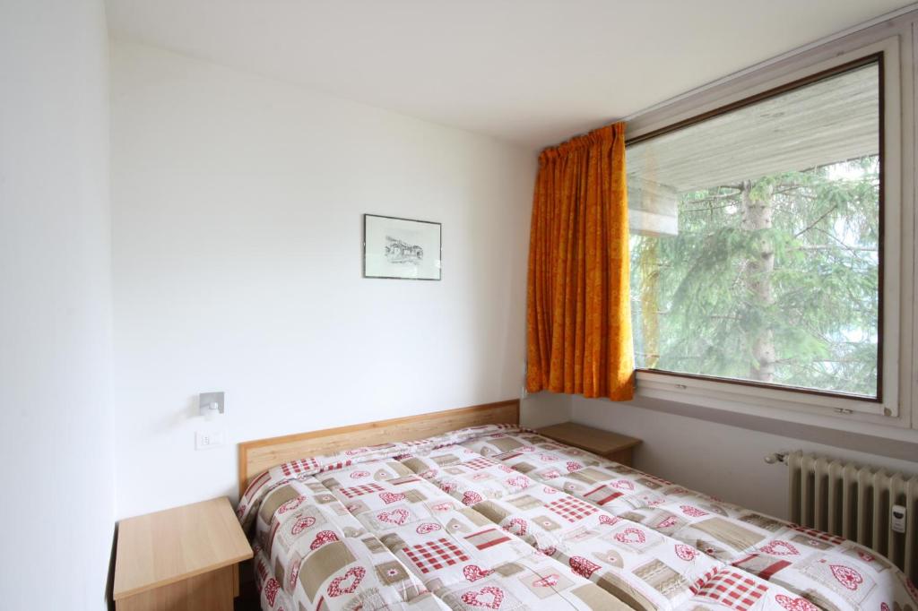 Postel nebo postele na pokoji v ubytování Residence Copai