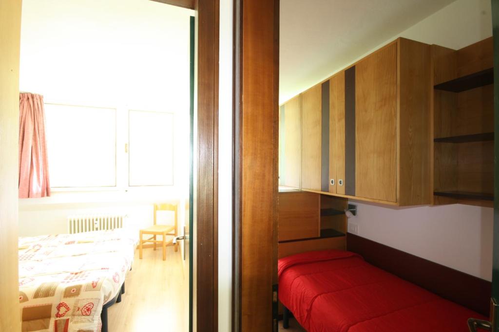 Postel nebo postele na pokoji v ubytování Residence Copai