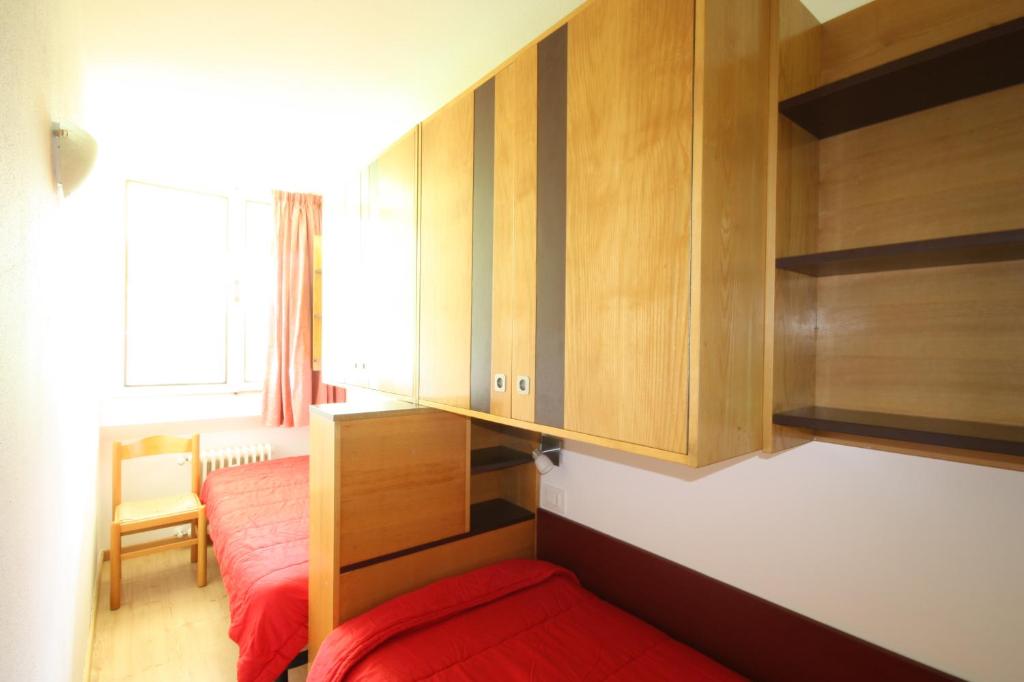 Postel nebo postele na pokoji v ubytování Residence Copai