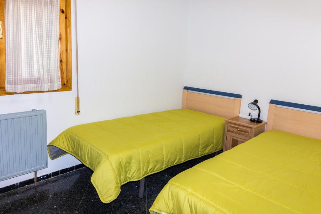 Postel nebo postele na pokoji v ubytování Biescas Doctor Fleming reg19-226