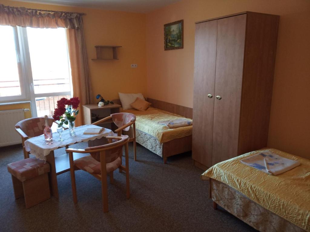 Postel nebo postele na pokoji v ubytování Willa ANNA