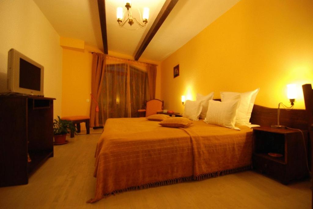 Letto o letti in una camera di Ezio House