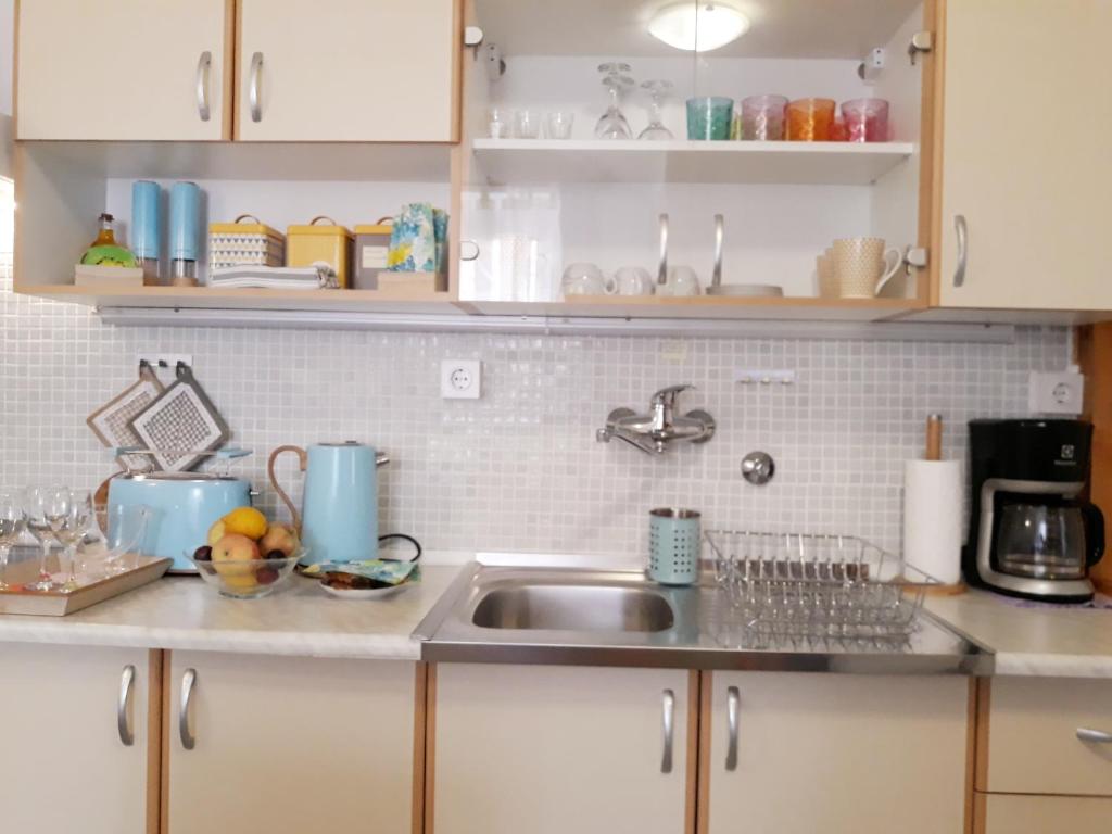 Kuchyňa alebo kuchynka v ubytovaní Atelier Tina Art Home