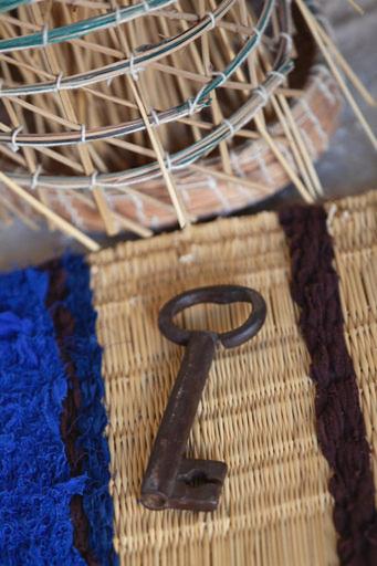 a number one on a basket with a metal latch at Dar Tenast in Houmt Souk