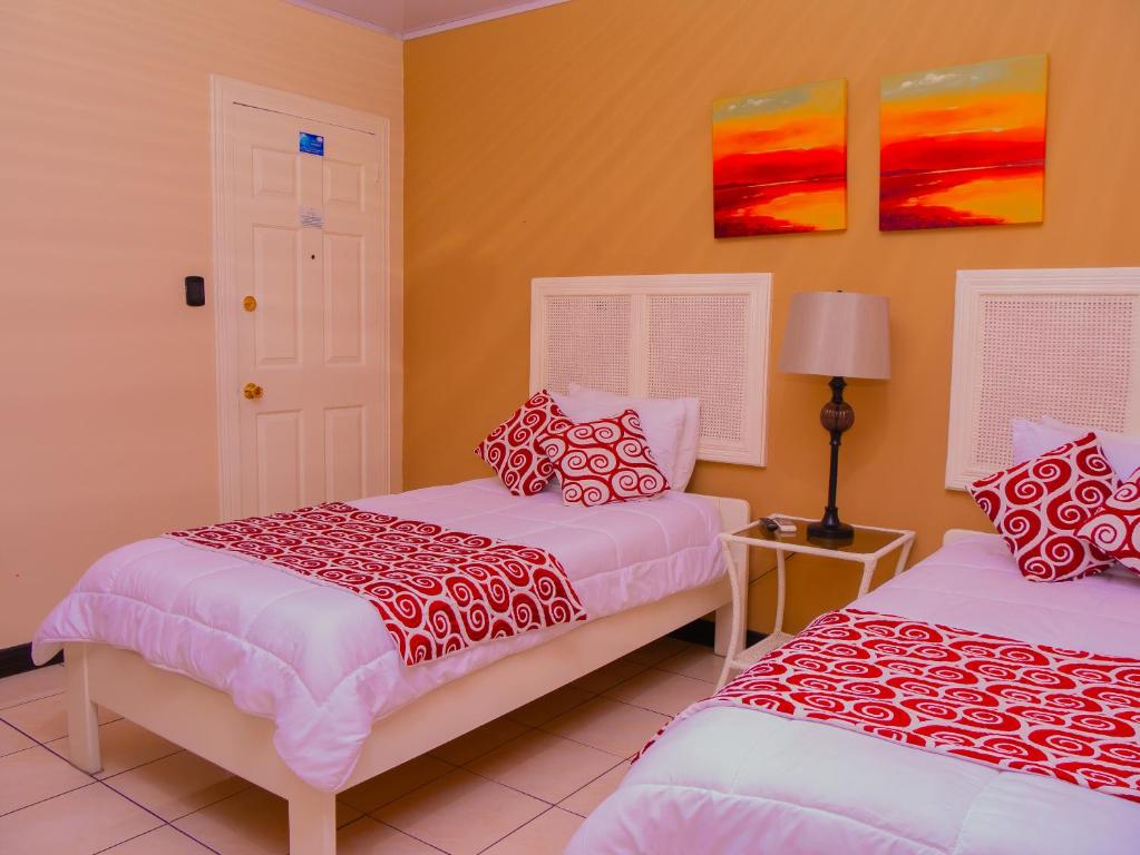 Postel nebo postele na pokoji v ubytování Hotel Bamboo Aeropuerto