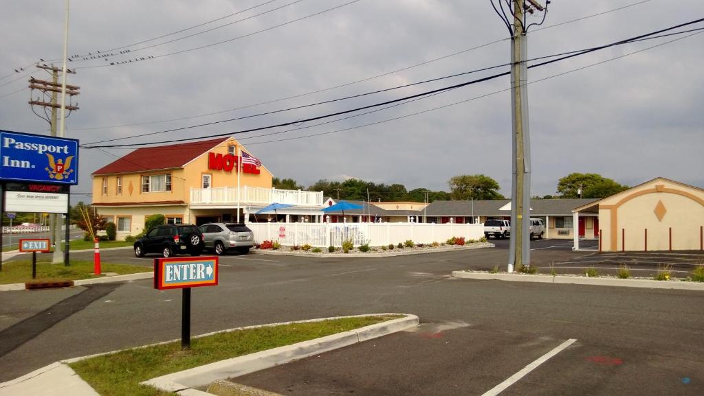 an empty street in a small town with a nippy sign at Passport Inn Somers Point - Somers Point in Somers Point