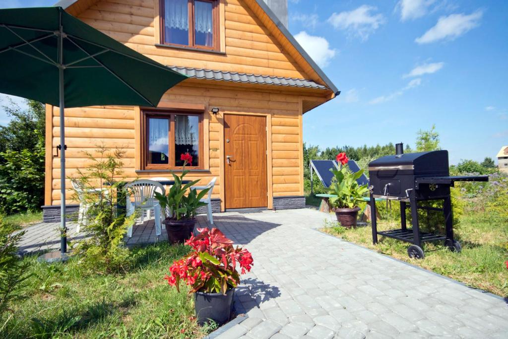 Vonkajšia záhrada v ubytovaní Domek Twórczy Kąt