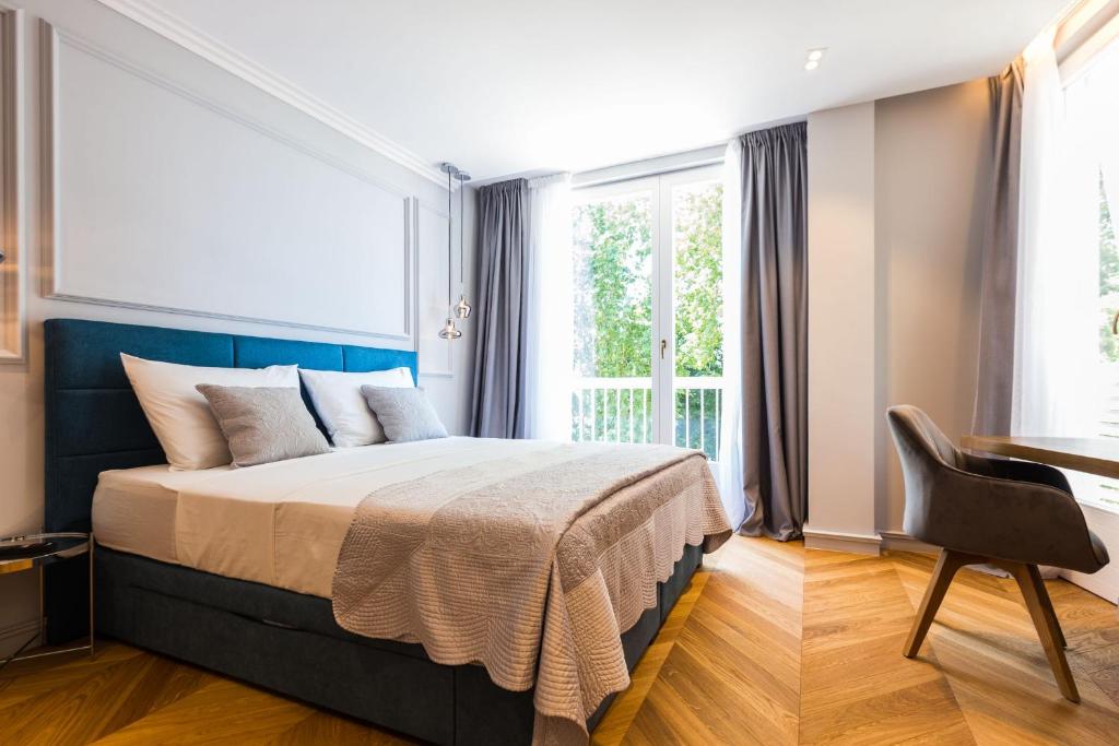 Postel nebo postele na pokoji v ubytování Muse luxury rooms