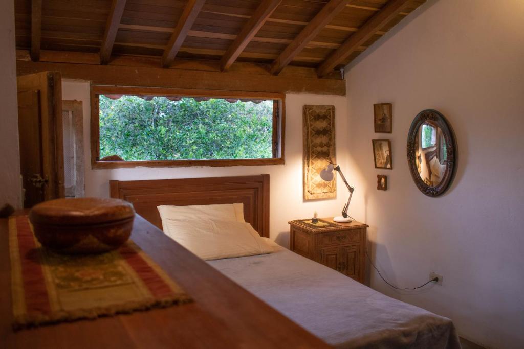 Postel nebo postele na pokoji v ubytování Casa El Cedro