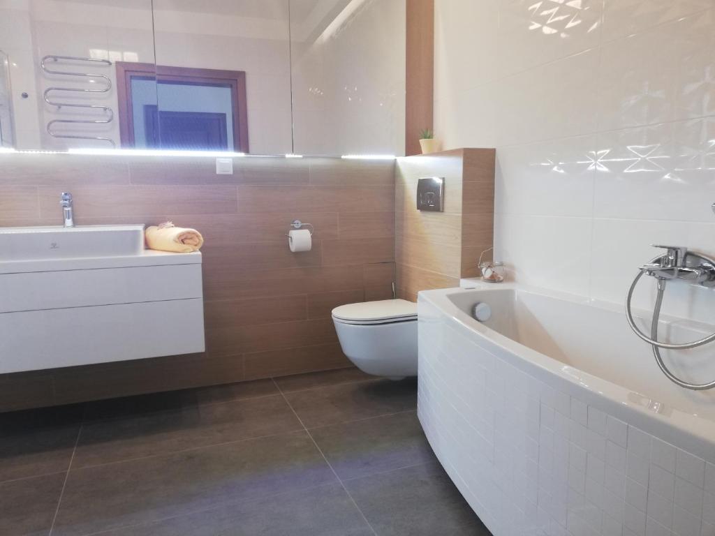 Kúpeľňa v ubytovaní Gdynia Orlowo Honey Apartment