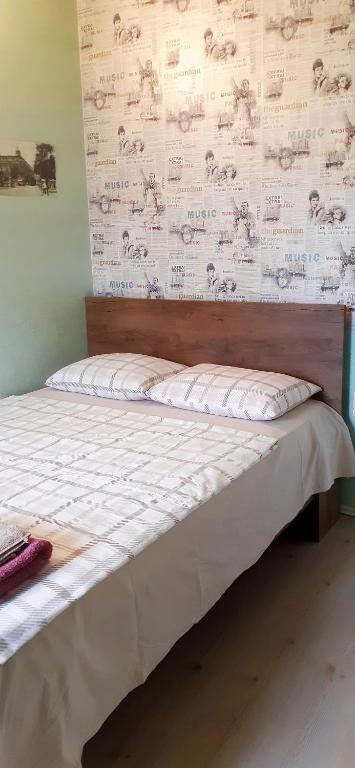 Postel nebo postele na pokoji v ubytování TJ Guest House
