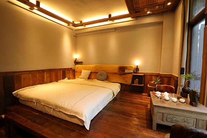 Postel nebo postele na pokoji v ubytování Yunlu Lianxin Guesthouse