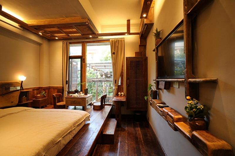 Postel nebo postele na pokoji v ubytování Yunlu Lianxin Guesthouse