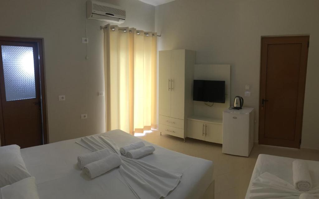Postel nebo postele na pokoji v ubytování Vila Balani