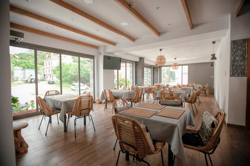 A restaurant or other place to eat at Oikia guesthouse