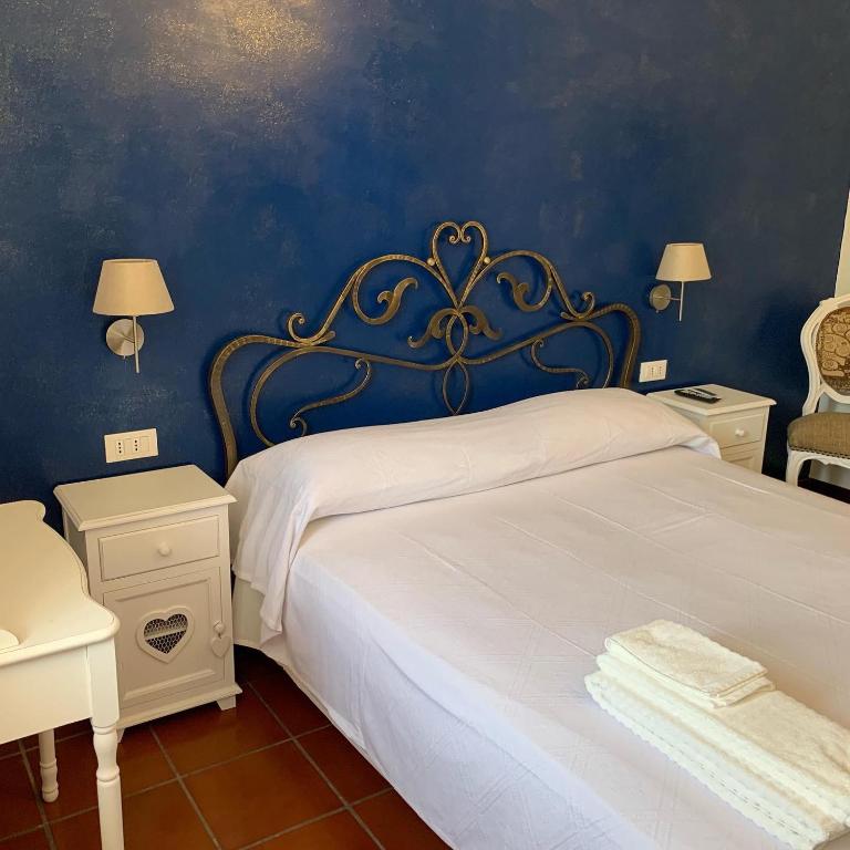 Posteľ alebo postele v izbe v ubytovaní B&b Villa Sofia