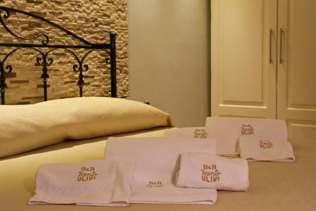 Postel nebo postele na pokoji v ubytování B&B 7Cento Ulivi