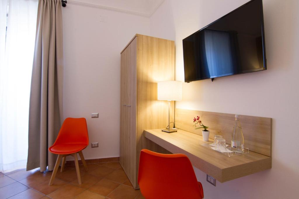 TV a/nebo společenská místnost v ubytování Residenza Normanna