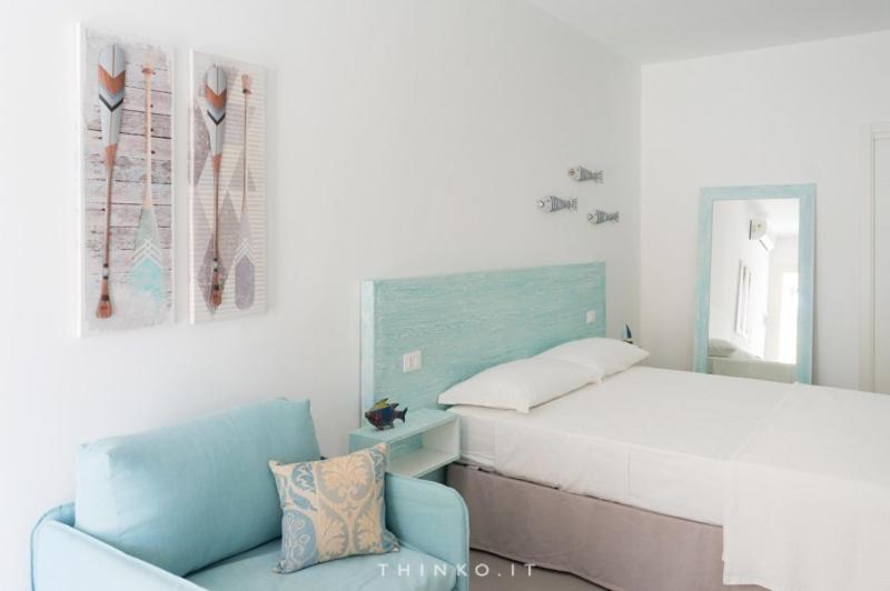 Postel nebo postele na pokoji v ubytování Hotel Universo