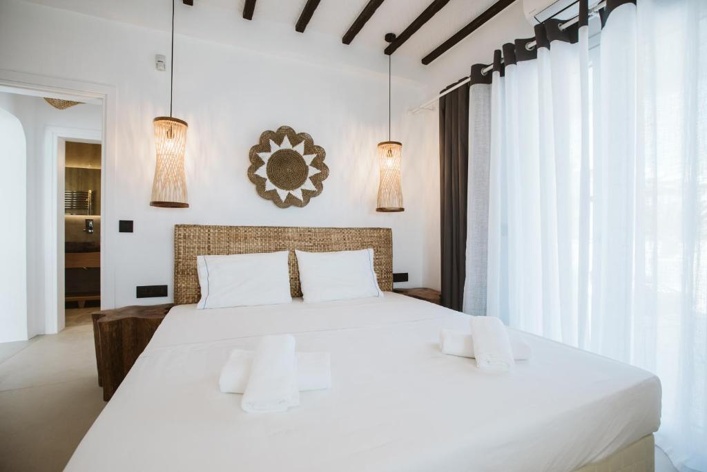 Postel nebo postele na pokoji v ubytování SeaCode Villas