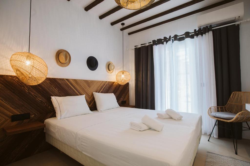 Postel nebo postele na pokoji v ubytování SeaCode Villas