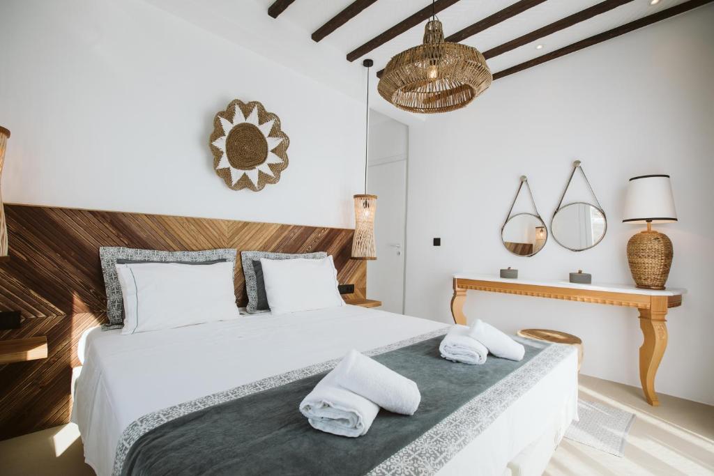 Postel nebo postele na pokoji v ubytování SeaCode Villas