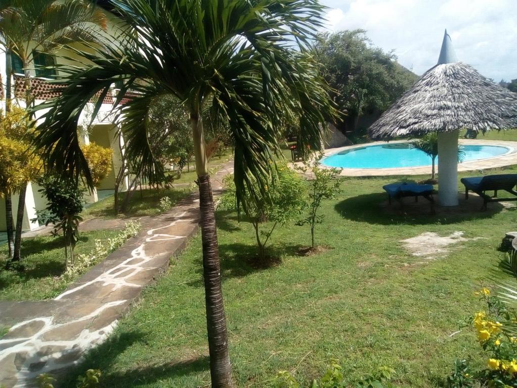 Bazén v ubytování Ashari Hotel nebo v jeho okolí