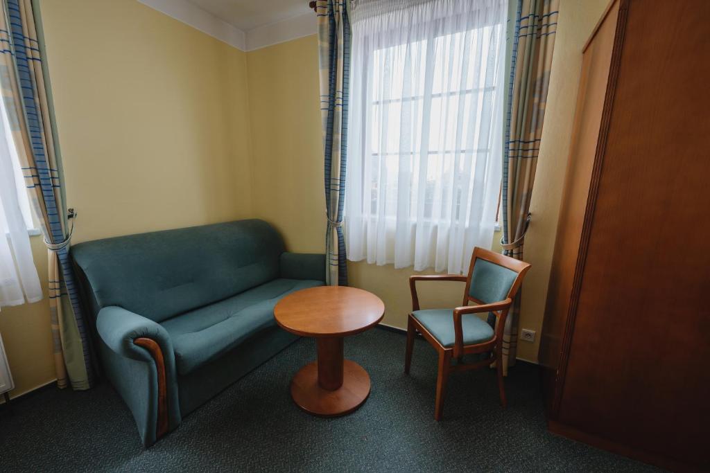 Posezení v ubytování Hotel Taverna