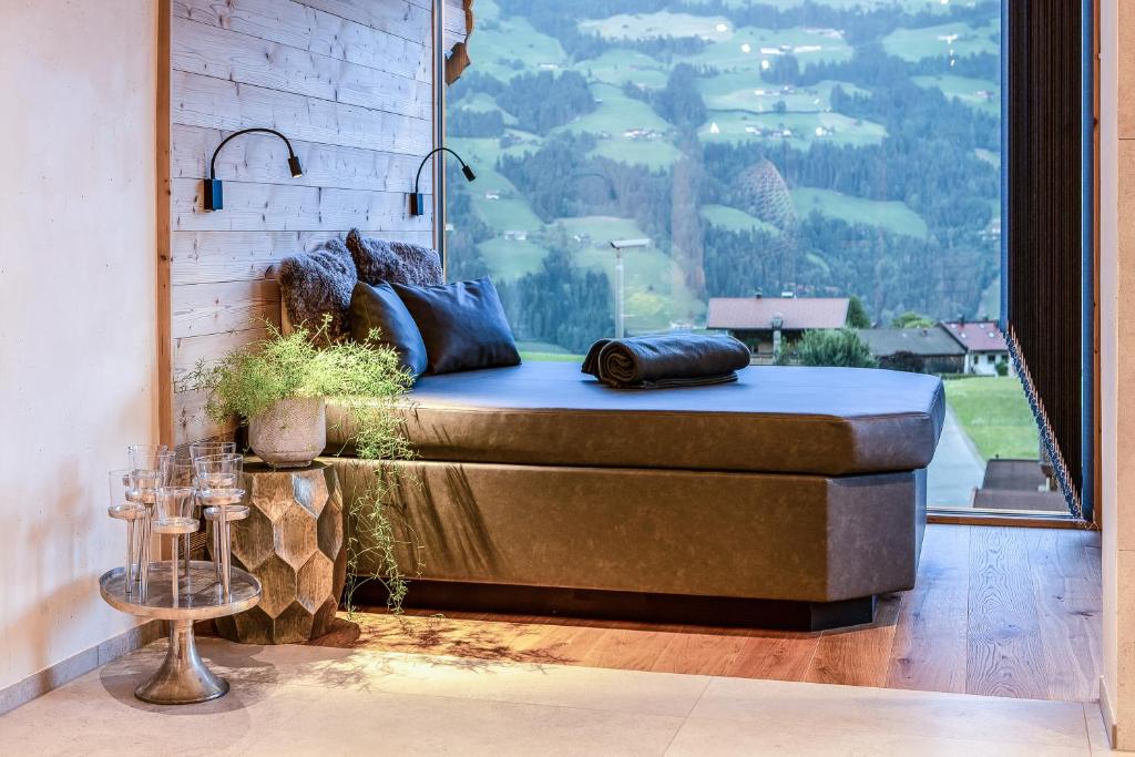 Posezení v ubytování "Chalet Bergzeit" Ferienhaus mit Sauna & Wellness