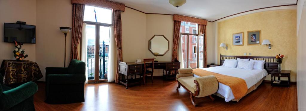 Postel nebo postele na pokoji v ubytování Hotel Real Audiencia