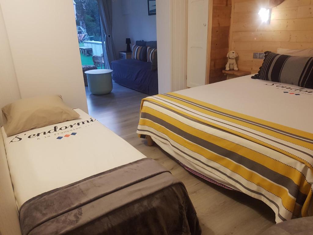 Postel nebo postele na pokoji v ubytování TISHA