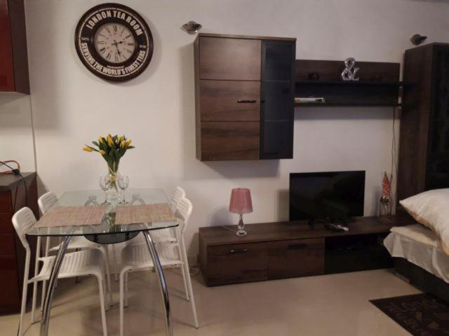 Posedenie v ubytovaní CHERRY APARTAMENT W ŚCISŁYM CENTRUM