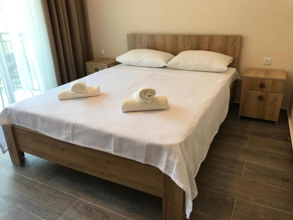 Postel nebo postele na pokoji v ubytování Hotel CHARLI