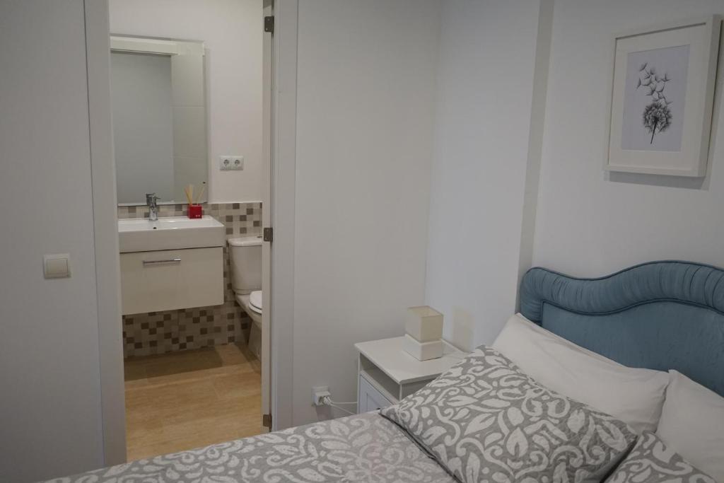 Posteľ alebo postele v izbe v ubytovaní Apartamento Estudio Los Naranjos de Nueva Alcántara