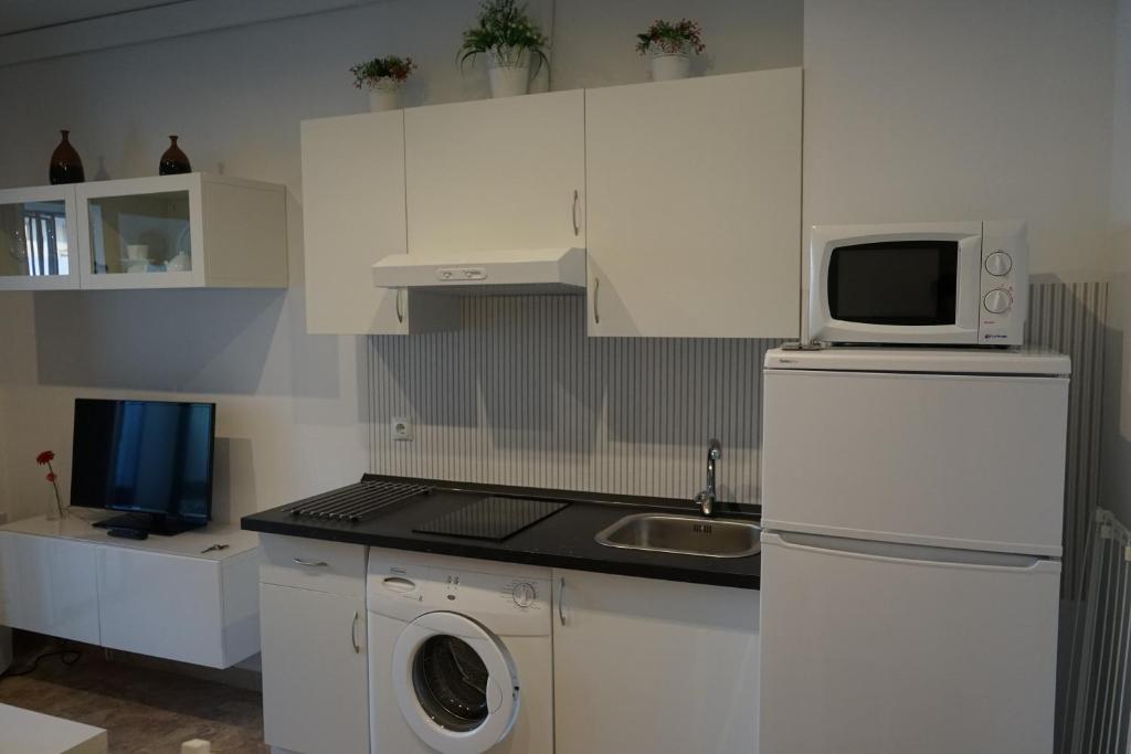 Kuchyňa alebo kuchynka v ubytovaní Apartamento Estudio Los Naranjos de Nueva Alcántara