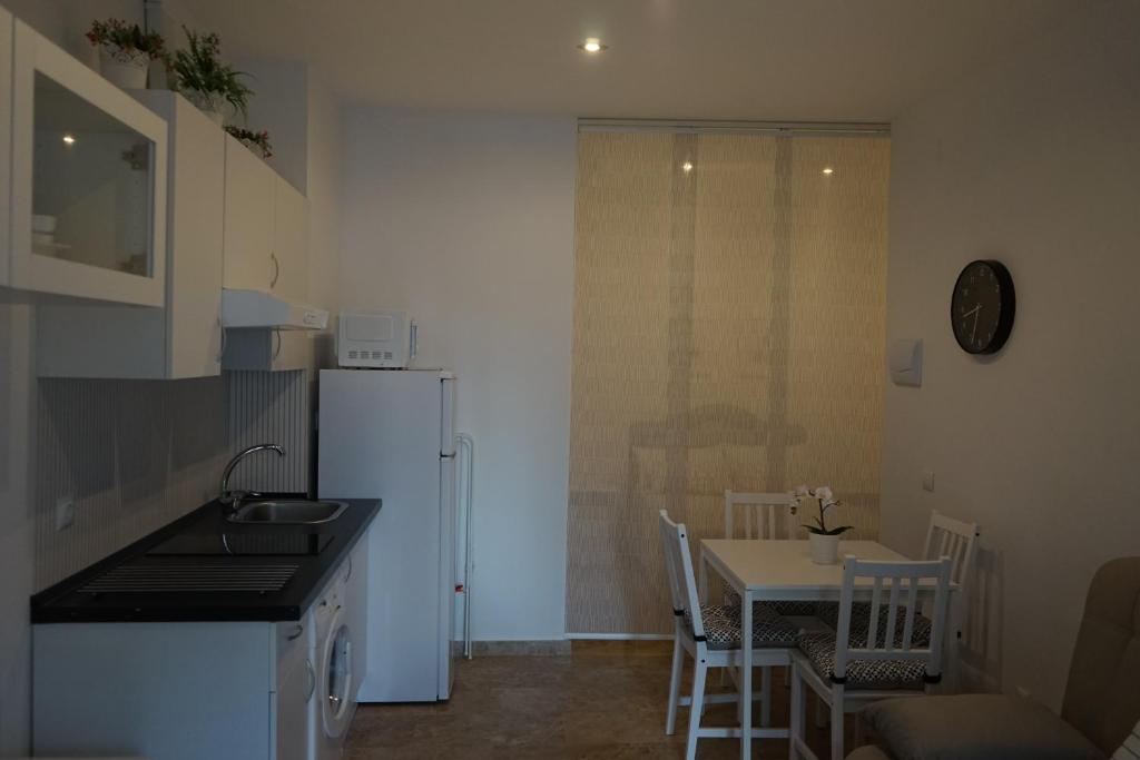 Kuchyňa alebo kuchynka v ubytovaní Apartamento Estudio Los Naranjos de Nueva Alcántara