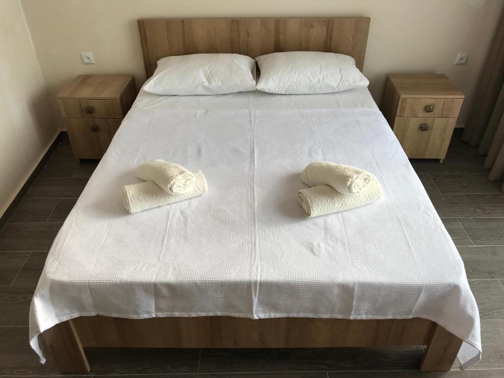 Postel nebo postele na pokoji v ubytování Hotel CHARLI