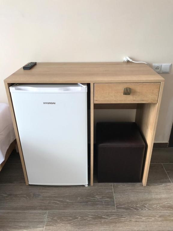 Kuchyň nebo kuchyňský kout v ubytování Hotel CHARLI